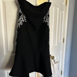 WHBM Size 10 Black cocktail dress with white accents.